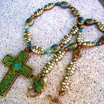 Green, Aqua, And Brass Necklace With Cross Pendant